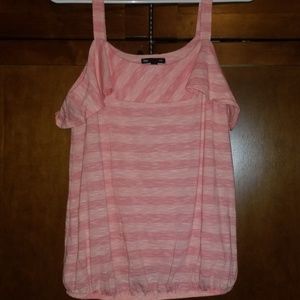 Pink ruffled tank top.